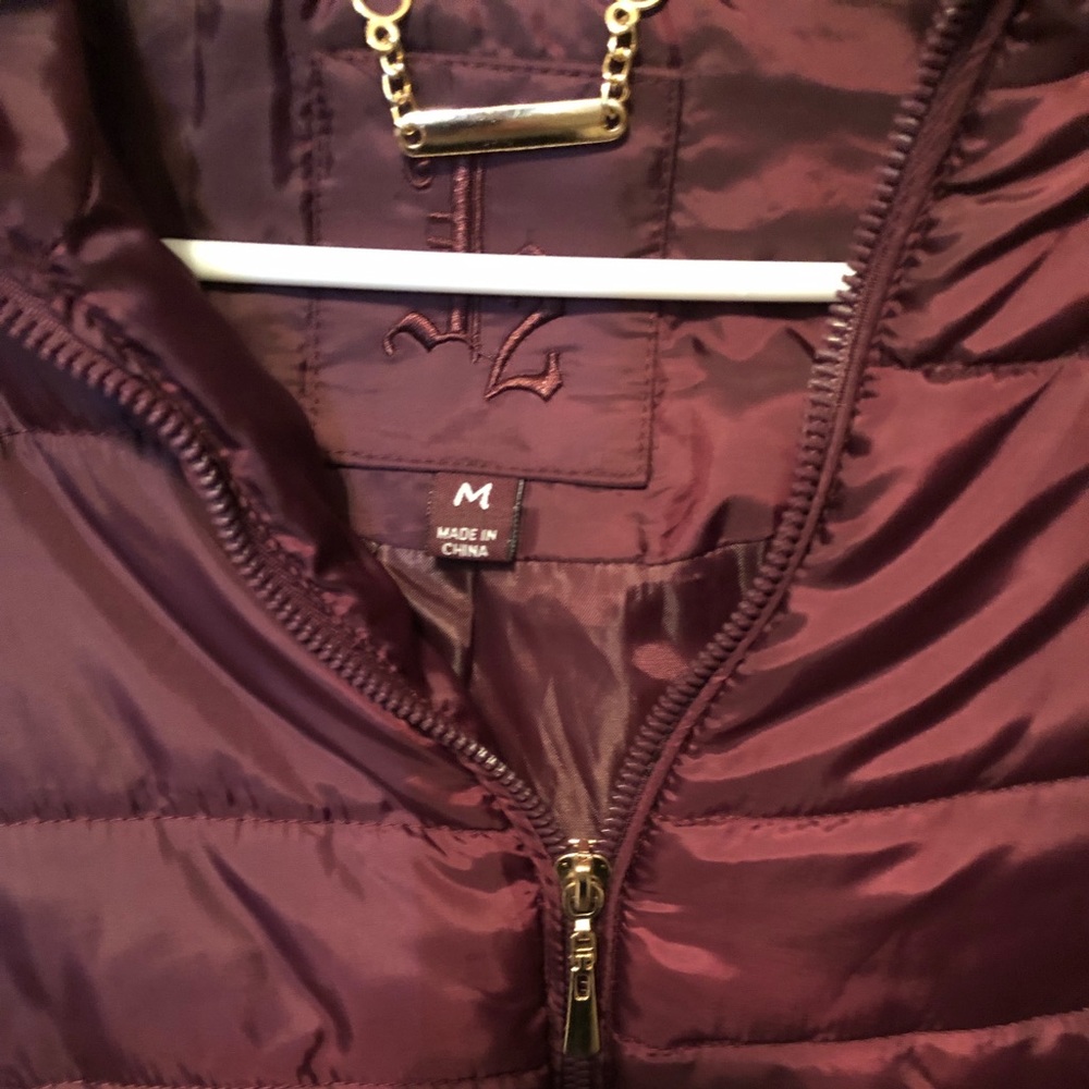 Burgundy Puffer coat. Never worn size medium